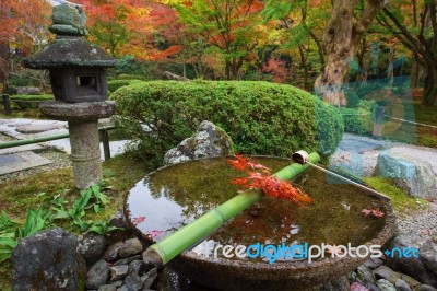 Water Dipper On Stone Basin At Enkoji Temple, Kyoto Stock Photo