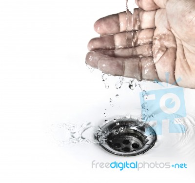 Water Flowing To Plughole Stock Photo