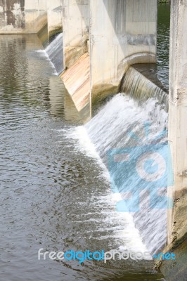 Water Stream From Weir Stock Photo