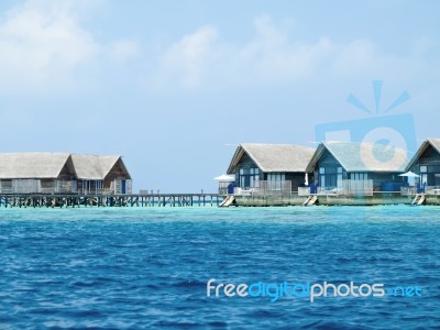 Water Villa Cottages On Island Stock Photo