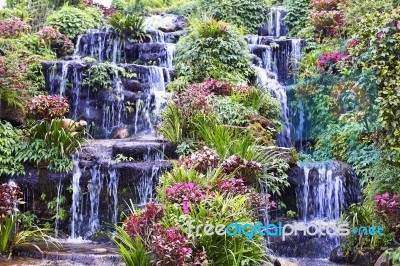 Waterfall And Statue At The Garden Stock Photo