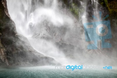 Waterfall At Milford Sound Stock Photo