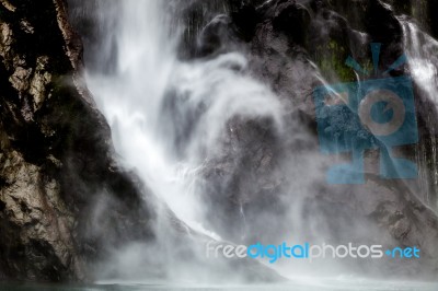 Waterfall At Milford Sound Stock Photo