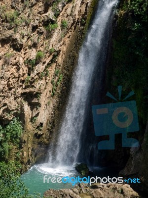 Waterfall Below The New Bridge At Ronda Spain Stock Photo