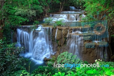 Waterfall In Tropical Forest, West Of Thailand Stock Photo