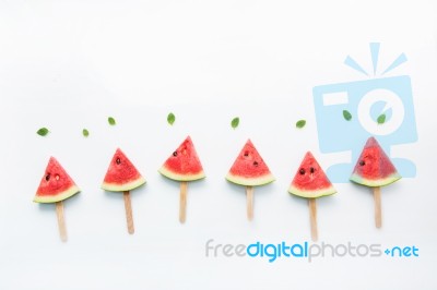 Watermelon Slice Popsicles And Paper Mint On White Wooden Backgr… Stock Photo