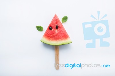 Watermelon Slice Popsicles And Paper Mint On White Wooden Backgr… Stock Photo