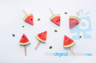 Watermelon Slice Popsicles On White Background Stock Photo