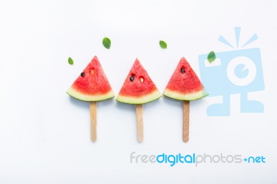 Watermelon Slice Popsicles On White Background Stock Photo