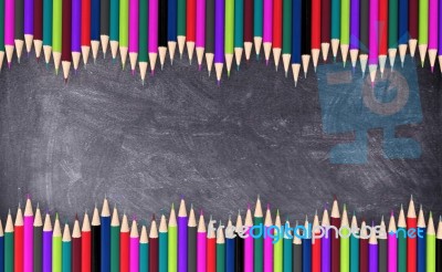 Wave Colored Pencils On Blackboard Stock Image