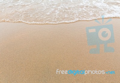 Wave Of The Sea On The Sandy Beach Stock Photo