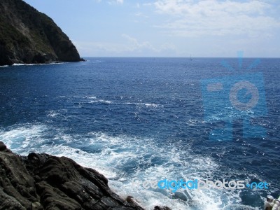 Waves Crashing On The Rocks Of The 5 Lands A Stock Photo