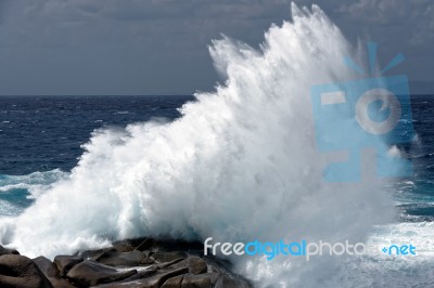 Waves Pounding The Coastline At Capo Testa Sardinia Stock Photo