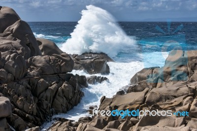 Waves Pounding The Coastline At Capo Testa Sardinia Stock Photo