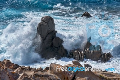 Waves Pounding The Coastline At Capo Testa Sardinia Stock Photo