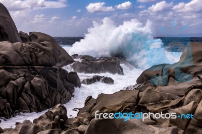 Waves Pounding The Coastline At Capo Testa Sardinia Stock Photo