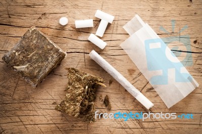 Weed Marijuana Hashish Roll Wood Background Stock Photo