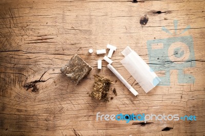 Weed Marijuana Hashish Roll Wood Background Stock Photo