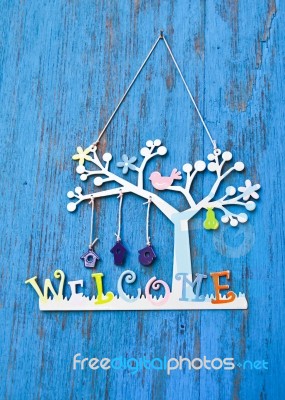 Welcome Word On Wooden Blue Door Stock Photo