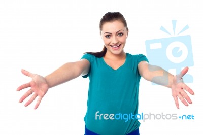 Welcoming Young Smiling Girl Stock Photo