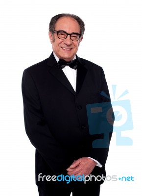 Well Dressed Smiling Senior Man Stock Photo