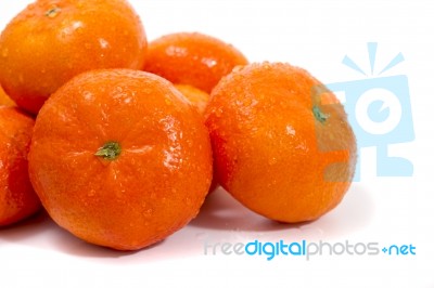 Wet Clementines Fruits Stock Photo