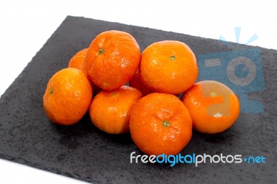 Wet Clementines Fruits Stock Photo