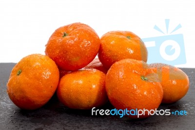 Wet Clementines Fruits Stock Photo