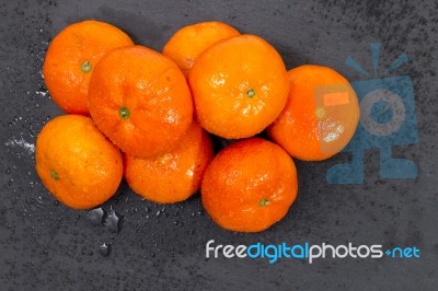 Wet Clementines Fruits Stock Photo