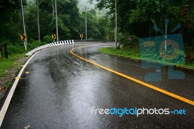 Wet Road Stock Photo