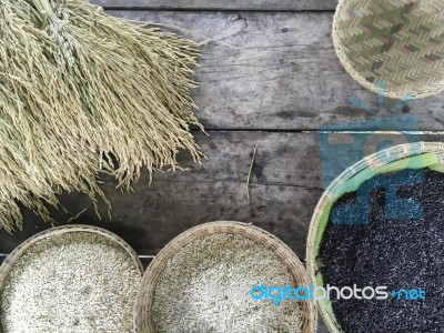 White And Black Organic Brown Rice In  Round Rattan Woven Basket… Stock Photo