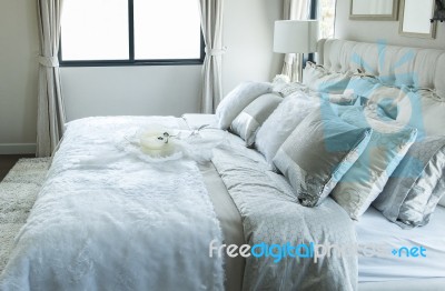 White And Grey Pillow On Bed Stock Photo