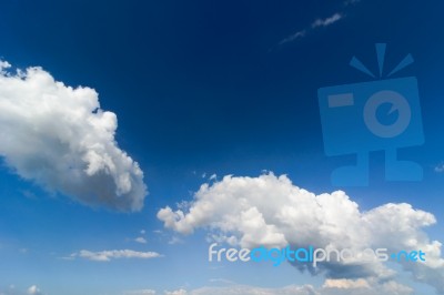 White Clouds In Blue Sky Stock Photo