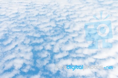 White Clouds On Blue Sky Background Stock Photo