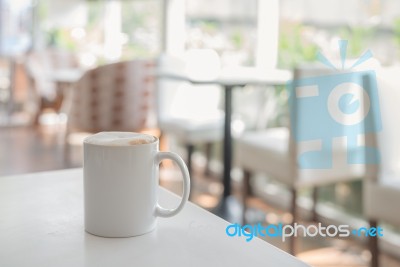 White Coffee Cup In Coffee Shop Stock Photo