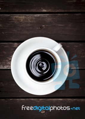 White Coffee Cup On Vintage Dark Wood Floor Stock Photo