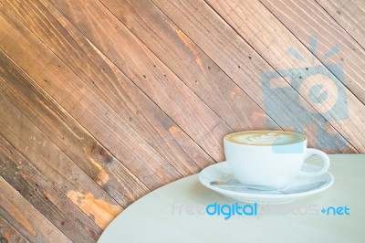 White Cup Of Coffee Latte On Wooden Backgound Stock Image