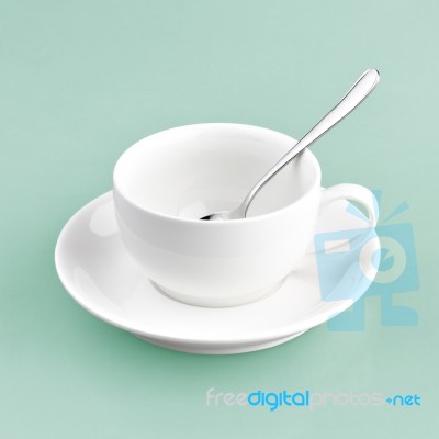 White Cup On Green Blue Background Solid Stock Photo