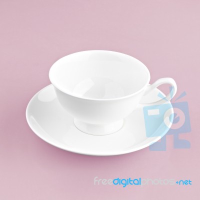 White Cup On Pink Background Solid Stock Photo