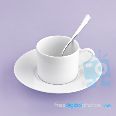 White Cup On Purple Background Solid Stock Photo