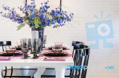 White Dinning Table With Black Chair In Dinning Room Stock Photo