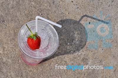 White Drinking Straw And Strawberry Stock Photo