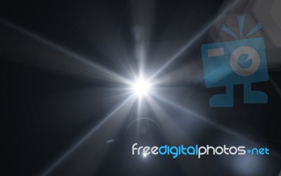 White Glowing Light Glitter Background Effect.digital Lens Flare With Bright Light In Black Background Stock Image