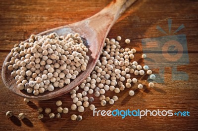 White Hot And Spicy Pepper On Wood Spoon Stock Photo