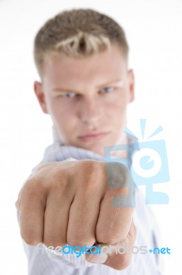 White Male Giving Punch Stock Photo