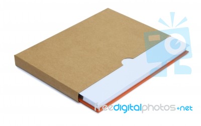 White Notebook In Brown Paper Case Isolated On White Background Stock Photo