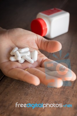 White Pills Medicine Headache On Hand Stock Photo