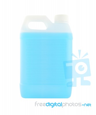 White Plastic Gallon With Blue Liquid On White Background Stock Photo