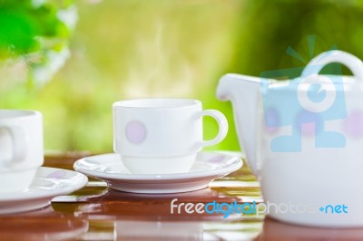 White Porcelain Set For Tea Or Coffee On Wooden Table Stock Photo