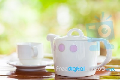 White Porcelain Set For Tea Or Coffee On Wooden Table Stock Photo